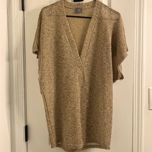 This stylish tunic is slightly see through so wear a cami or tee underneath